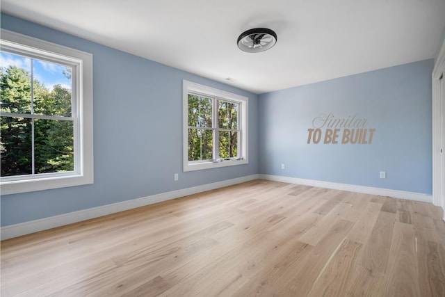 4-16 Tatnic Rd, Wells, ME 04090 - unfurnished room with light wood-type flooring and baseboards