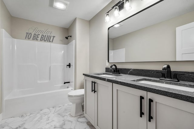 4-16 Tatnic Rd, Wells, ME 04090 - bathroom featuring toilet, marble finish floor, shower / tub combination, and a sink