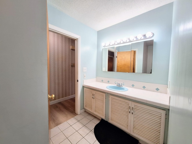 31 Arbor Ave, Topsham, ME 04086 - bathroom featuring vanity, tile patterned flooring, and a textured ceiling