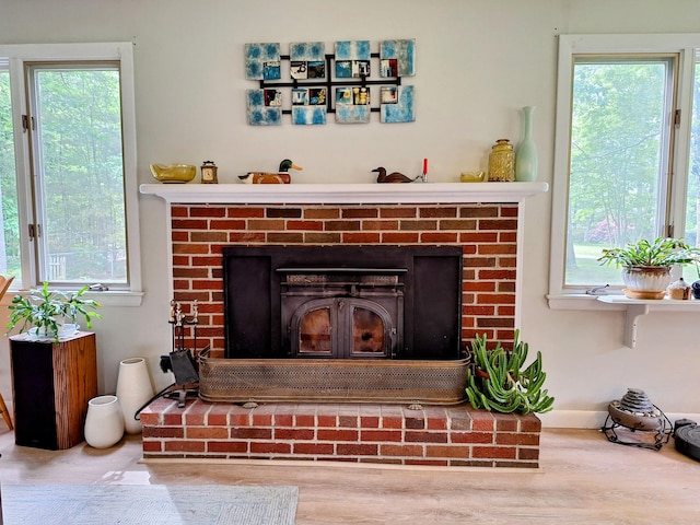 31 Arbor Ave, Topsham, ME 04086 - detailed view of a fireplace and wood finished floors