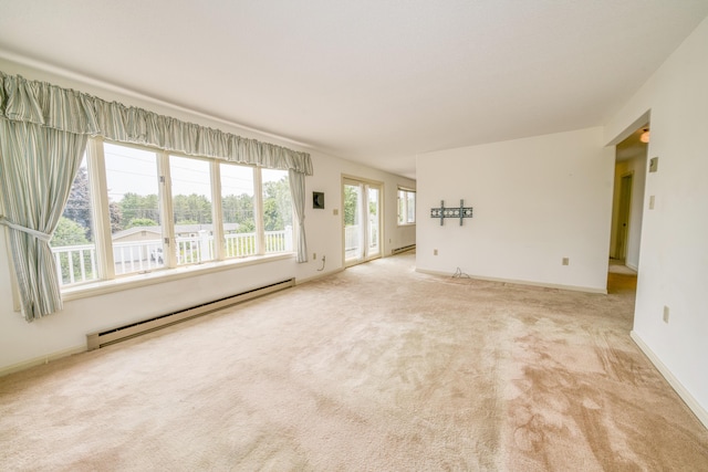 6 Seaside Dr, Belfast, ME 04915 - spare room with a baseboard radiator, carpet flooring, and a baseboard heating unit