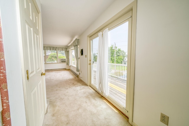 6 Seaside Dr, Belfast, ME 04915 - hallway with light carpet and a baseboard heating unit