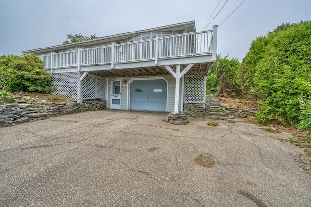 6 Seaside Dr, Belfast, ME 04915 - view of front of home with a garage and asphalt driveway