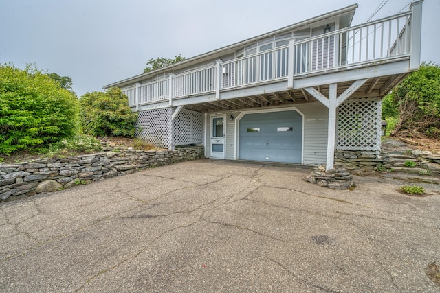 6 Seaside Dr, Belfast, ME 04915 - view of side of home featuring a balcony, an attached garage, and driveway