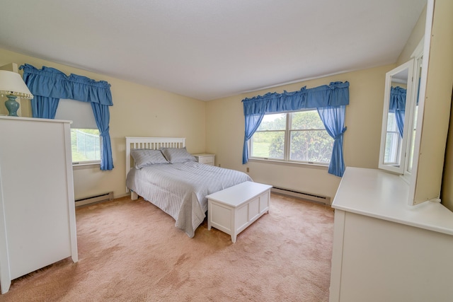 6 Seaside Dr, Belfast, ME 04915 - bedroom featuring baseboard heating, multiple windows, and light carpet