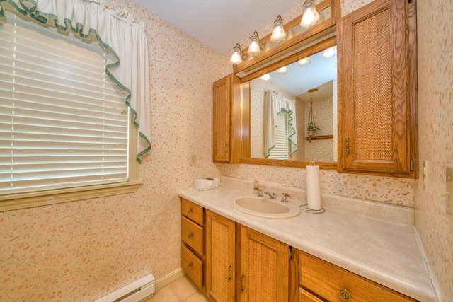 6 Seaside Dr, Belfast, ME 04915 - bathroom featuring wallpapered walls, vanity, tile patterned floors, and a baseboard radiator