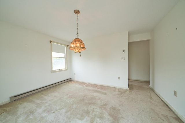 6 Seaside Dr, Belfast, ME 04915 - spare room featuring a baseboard heating unit, a chandelier, and carpet