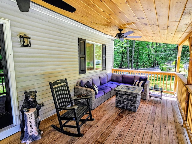 137 Maplewood Dr, Naples, ME 04055 - deck with an outdoor living space with a fire pit and ceiling fan