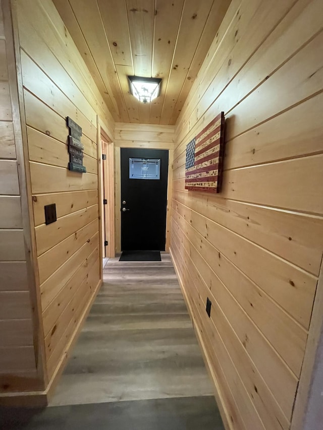 137 Maplewood Dr, Naples, ME 04055 - doorway featuring wood walls, wood finished floors, and wooden ceiling