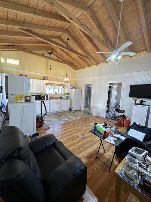 living room featuring wooden ceiling, ceiling fan, high vaulted ceiling, and light wood-style flooring