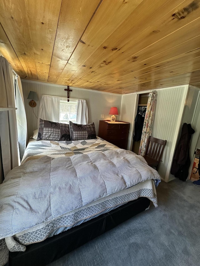 bedroom with carpet flooring, wood ceiling, and wood walls