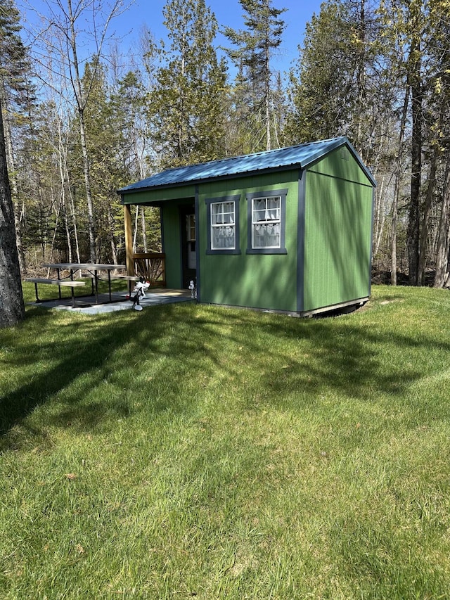 view of outbuilding with an outdoor structure