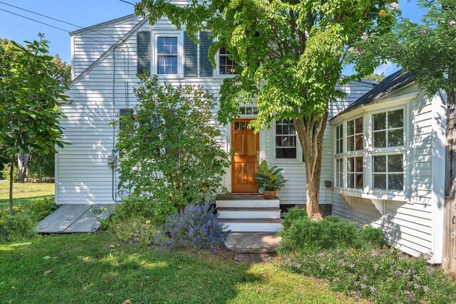 258 River Rd, Eliot, ME 03903 - view of front of house featuring a front yard and entry steps
