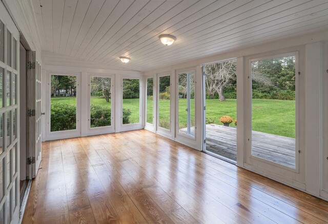 258 River Rd, Eliot, ME 03903 - unfurnished sunroom with french doors, wood-type flooring, and plenty of natural light