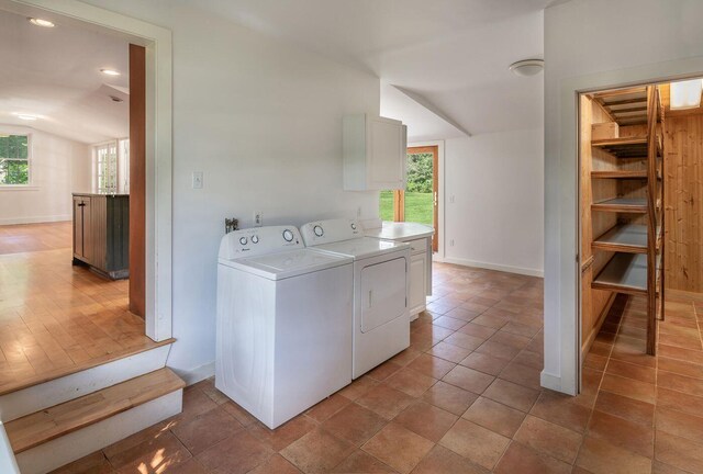 258 River Rd, Eliot, ME 03903 - laundry room featuring cabinet space, baseboards, and washing machine and dryer