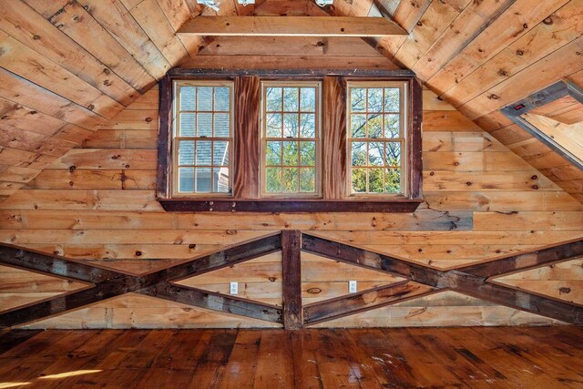 258 River Rd, Eliot, ME 03903 - interior space featuring wood ceiling, vaulted ceiling, wood walls, and hardwood / wood-style floors