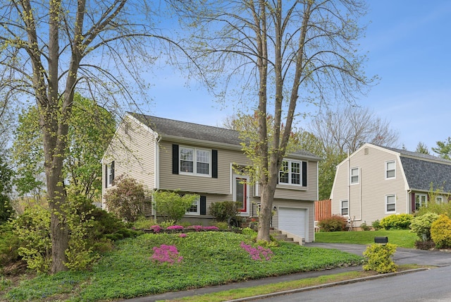 171 Regan Ln, Portland, ME 04103 - split foyer home featuring driveway and an attached garage