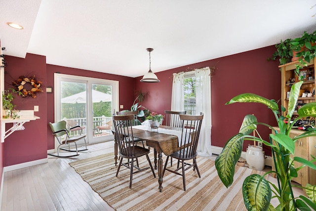 171 Regan Ln, Portland, ME 04103 - dining space with baseboards and light wood-style floors