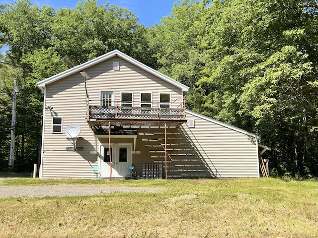 1057 Back Brooks Rd, Monroe, ME 04951 - rear view of house with a yard and a deck