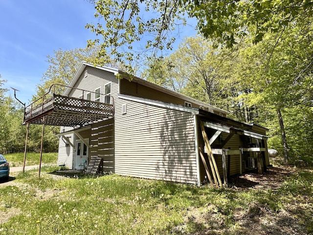 1057 Back Brooks Rd, Monroe, ME 04951 - view of side of property with a wooden deck