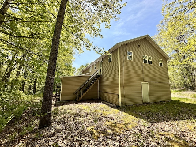 1057 Back Brooks Rd, Monroe, ME 04951 - view of side of property featuring stairway