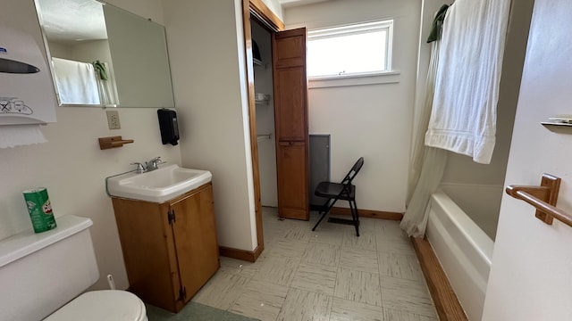 1057 Back Brooks Rd, Monroe, ME 04951 - bathroom with toilet, tile patterned floors, and vanity