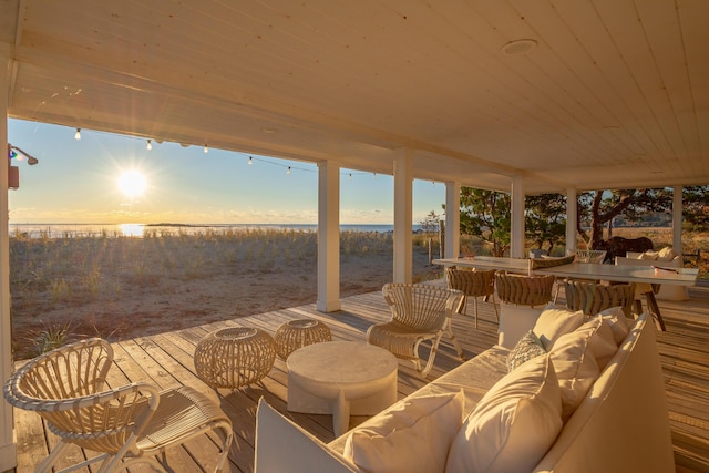 33 Massacre Ln, Scarborough, ME 04074 - patio terrace at dusk featuring a water view, an outdoor living space, and outdoor dining area
