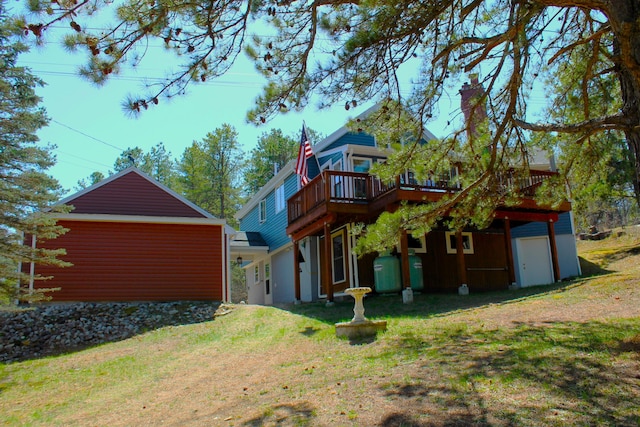 372 Pine Springs Rd, Shapleigh, ME 04076 - back of property featuring a yard and a deck