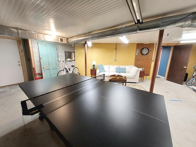 372 Pine Springs Rd, Shapleigh, ME 04076 - game room with finished concrete floors