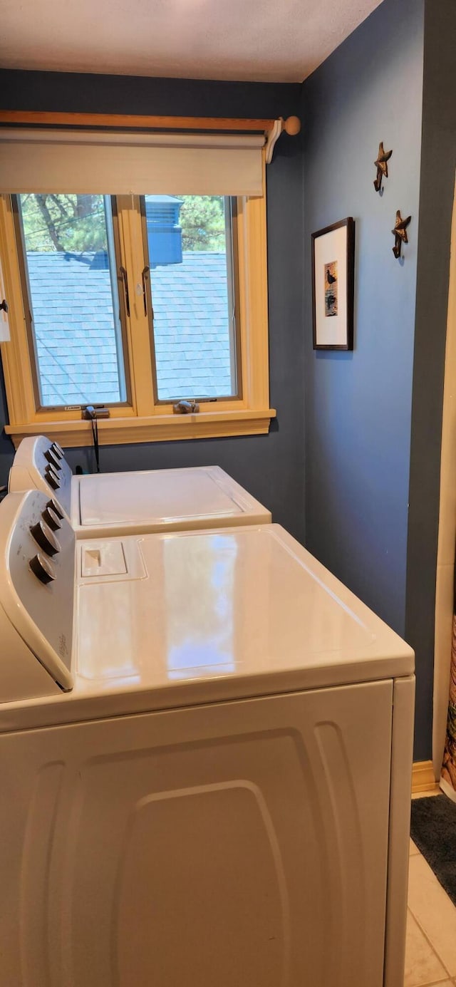 372 Pine Springs Rd, Shapleigh, ME 04076 - washroom featuring washing machine and dryer and light tile patterned flooring