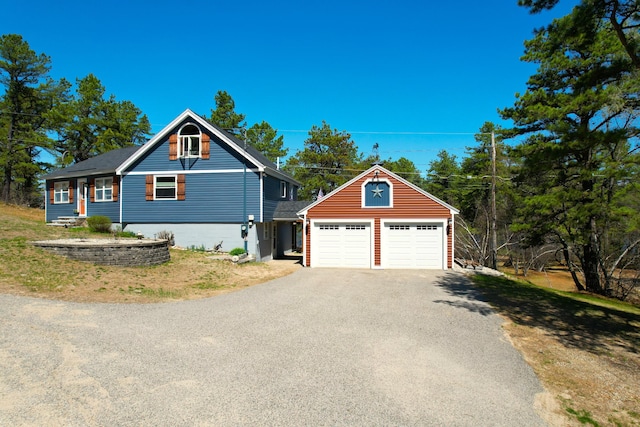 372 Pine Springs Rd, Shapleigh, ME 04076 - view of side of property featuring a detached garage and an outdoor structure