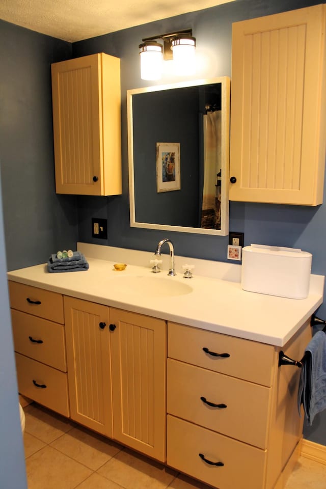 372 Pine Springs Rd, Shapleigh, ME 04076 - bathroom with vanity and tile patterned floors
