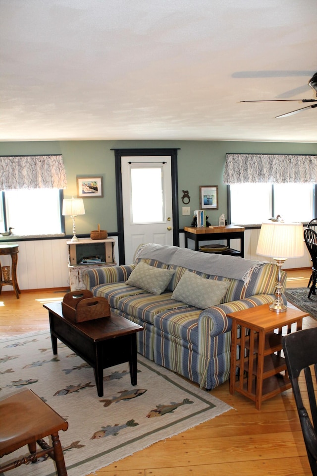372 Pine Springs Rd, Shapleigh, ME 04076 - living room with wood finished floors and ceiling fan
