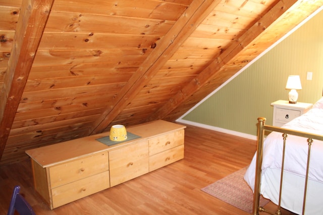 372 Pine Springs Rd, Shapleigh, ME 04076 - bedroom featuring wood finished floors and wooden ceiling