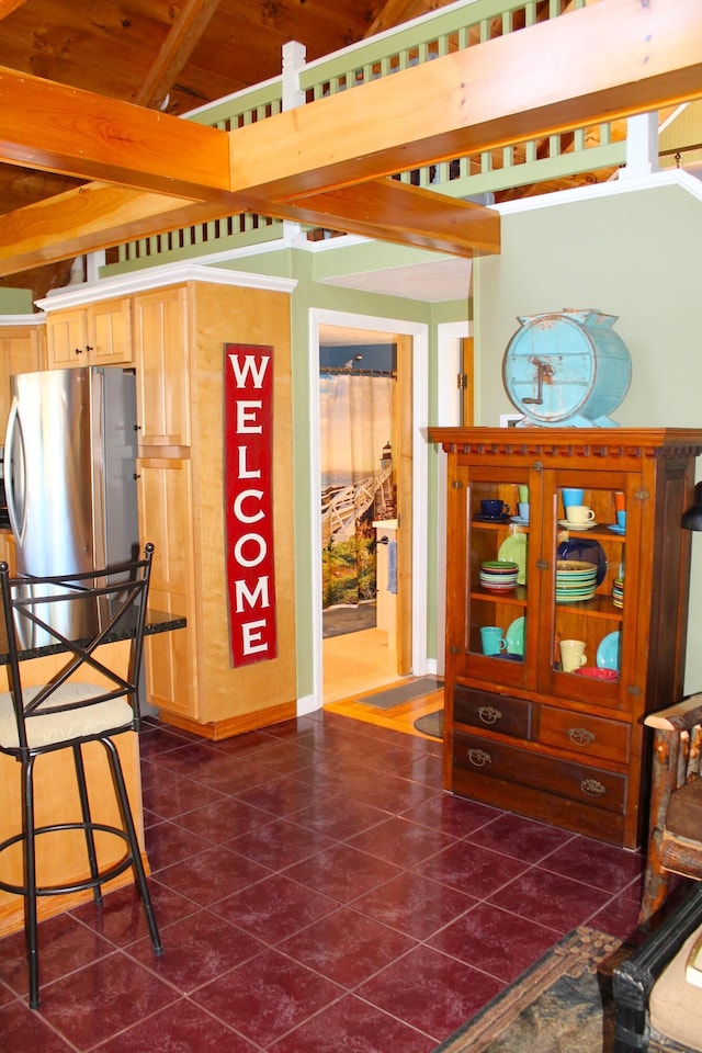 372 Pine Springs Rd, Shapleigh, ME 04076 - interior space featuring freestanding refrigerator and beamed ceiling