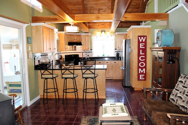 372 Pine Springs Rd, Shapleigh, ME 04076 - kitchen with light brown cabinetry, range, a peninsula, freestanding refrigerator, and dark countertops