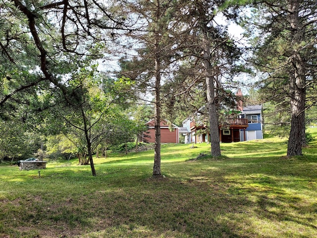 372 Pine Springs Rd, Shapleigh, ME 04076 - view of green lawn featuring a wooden deck