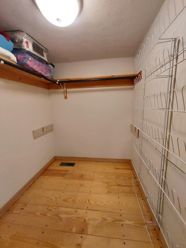 372 Pine Springs Rd, Shapleigh, ME 04076 - walk in closet featuring light wood finished floors