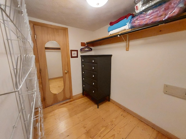 372 Pine Springs Rd, Shapleigh, ME 04076 - walk in closet with light wood finished floors