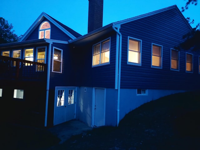 372 Pine Springs Rd, Shapleigh, ME 04076 - back of house with a chimney and a sunroom
