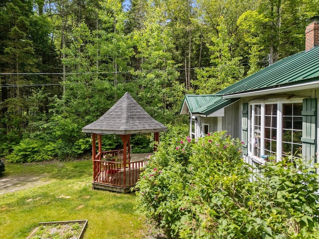 95 Hatcase Pond Rd, Eddington, ME 04428 - view of green lawn featuring a gazebo and a forest view