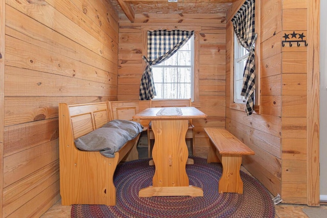 interior space featuring a sauna and wood walls