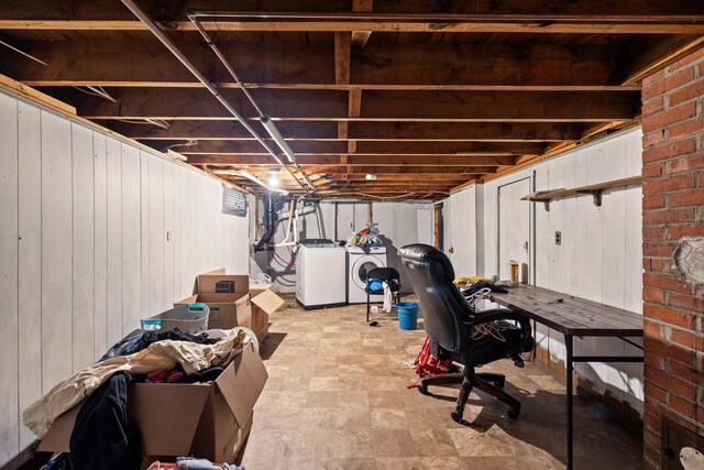1654 Carl Broggi Hwy, Lebanon, ME 04027 - unfinished below grade area featuring wooden walls and washer and dryer