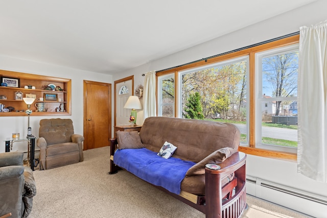 18 Grant St, Sanford, ME 04083 - living room featuring light colored carpet and baseboard heating