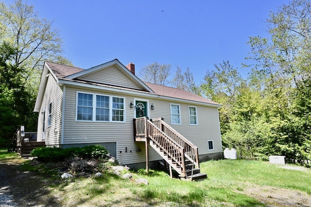 47 Taylor Ln, Naples, ME 04055 - back of house with a chimney and a yard