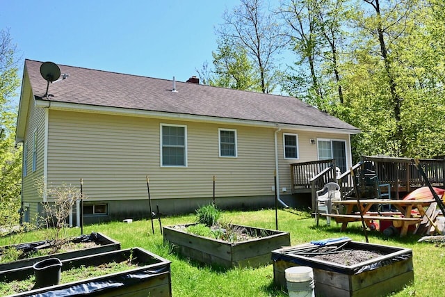 47 Taylor Ln, Naples, ME 04055 - rear view of house with a garden, a wooden deck, a shingled roof, and a yard