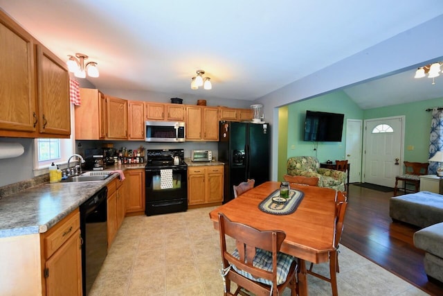 47 Taylor Ln, Naples, ME 04055 - kitchen with black appliances, a sink, open floor plan, and lofted ceiling