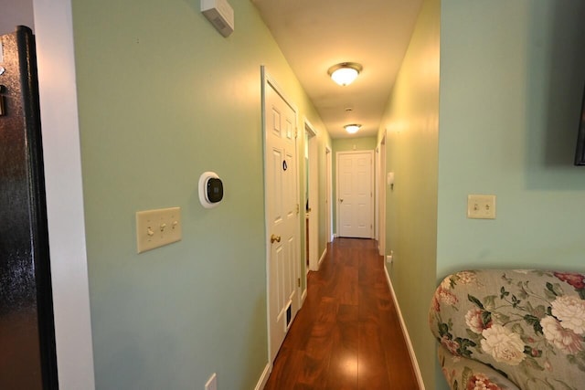 47 Taylor Ln, Naples, ME 04055 - corridor with dark wood-style floors and baseboards