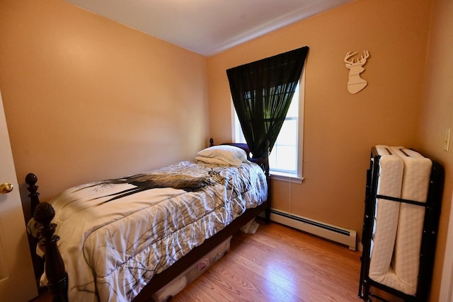 47 Taylor Ln, Naples, ME 04055 - bedroom with baseboard heating and wood finished floors