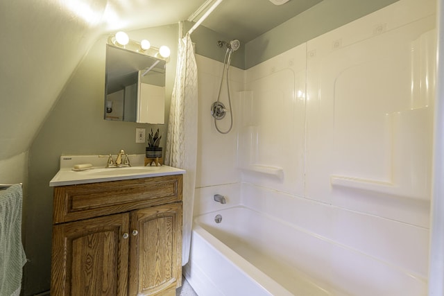 full bathroom with vanity, shower / bathtub combination with curtain, and lofted ceiling